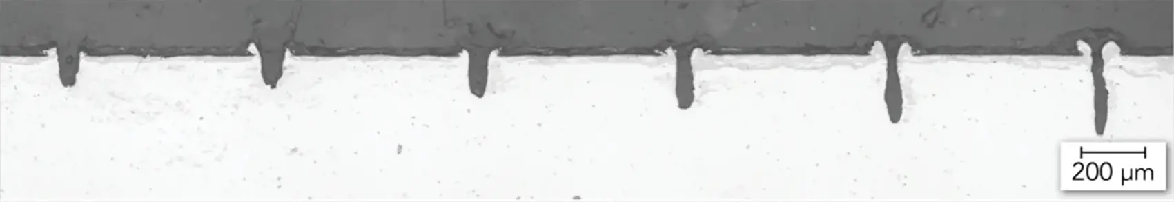 Fig. 3 Several laser beam scans to get a good groove shape