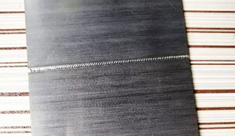 Pulsed welding of stainless steel plate with Nd 3 + YAG laser